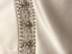 Darcy ivory satin wedding dress - close up of trim